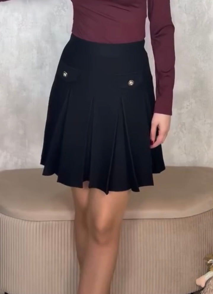 Falda de punto tableada